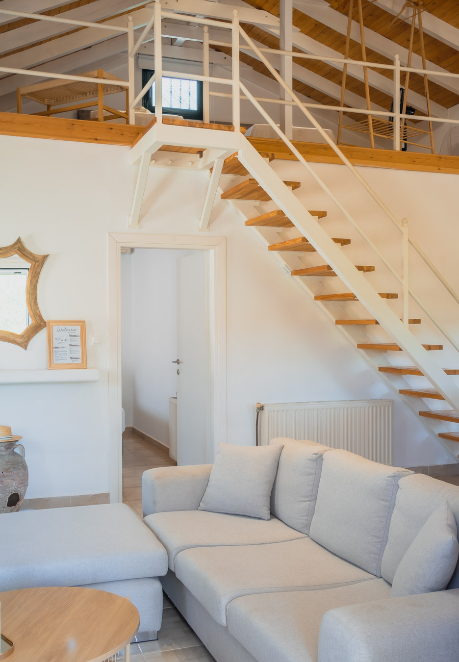 Living room with stairs to the loft